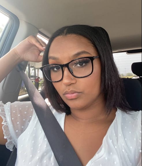 Client with a sleek shoulder-length dark bob